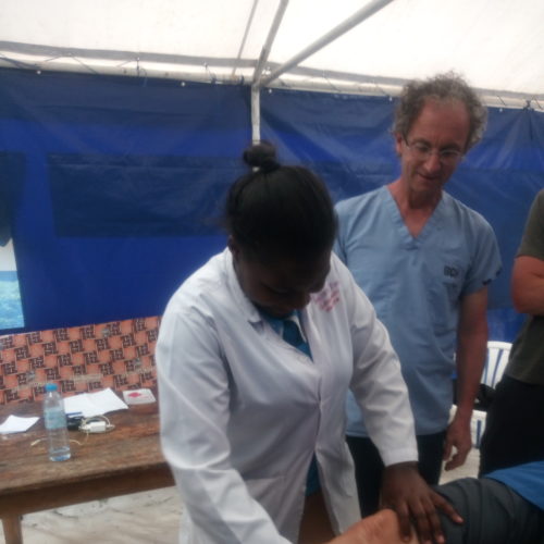 Eunice learns to examine a knee